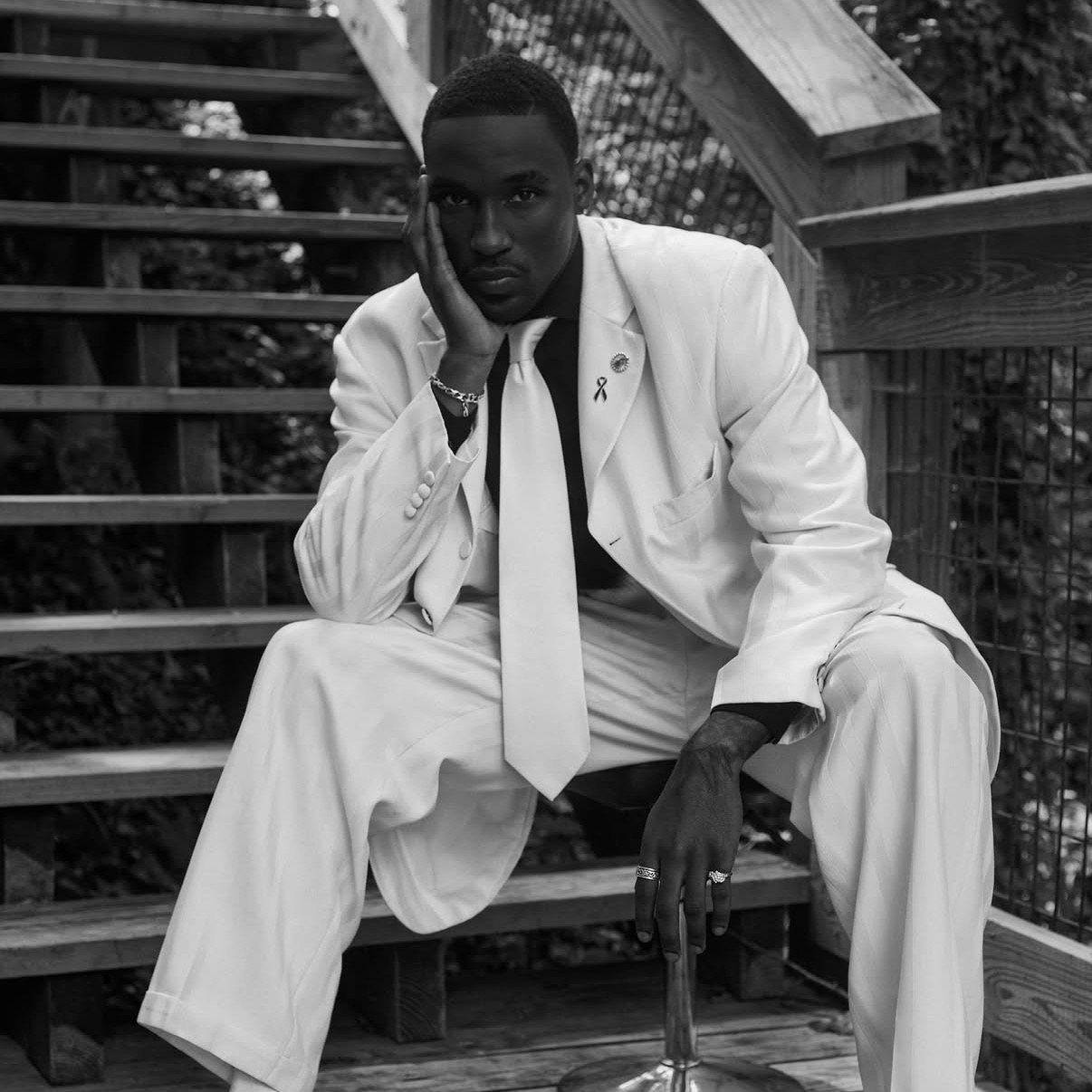 Kyyiren Terrell Sharp in a white suit